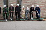 The ceremonial shoveling of dirt during the groundbreaking for the library renovation. by Harold Rau